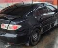 Черный Мазда 6, объемом двигателя 2 л и пробегом 317 тыс. км за 3000 $, фото 1 на Automoto.ua