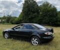 Черный Мазда 6, объемом двигателя 2 л и пробегом 280 тыс. км за 2400 $, фото 1 на Automoto.ua
