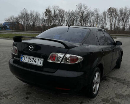 Черный Мазда 6, объемом двигателя 2 л и пробегом 200 тыс. км за 3500 $, фото 9 на Automoto.ua