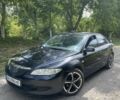 Чорний Мазда 6, об'ємом двигуна 2.3 л та пробігом 291 тис. км за 2497 $, фото 1 на Automoto.ua