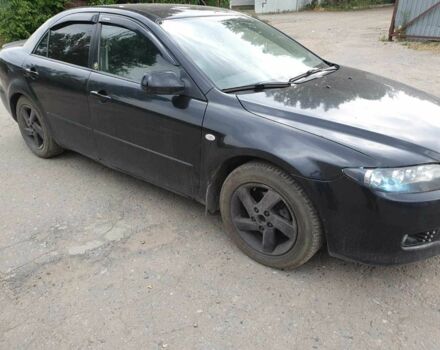 Черный Мазда 6, объемом двигателя 2 л и пробегом 270 тыс. км за 3500 $, фото 1 на Automoto.ua