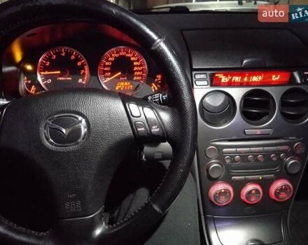 Черный Мазда 6, объемом двигателя 2 л и пробегом 249 тыс. км за 4555 $, фото 4 на Automoto.ua