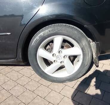 Черный Мазда 6, объемом двигателя 2 л и пробегом 374 тыс. км за 4199 $, фото 12 на Automoto.ua