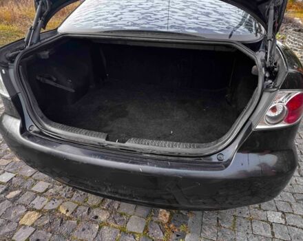 Черный Мазда 6, объемом двигателя 1.8 л и пробегом 250 тыс. км за 2000 $, фото 6 на Automoto.ua