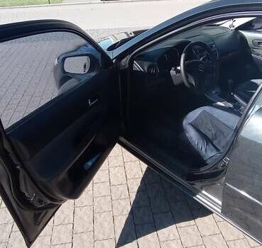 Черный Мазда 6, объемом двигателя 2 л и пробегом 374 тыс. км за 4199 $, фото 20 на Automoto.ua