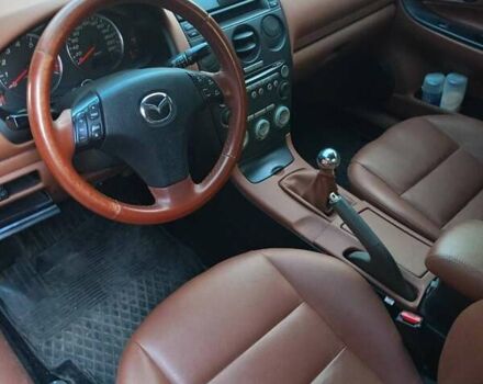 Черный Мазда 6, объемом двигателя 2 л и пробегом 245 тыс. км за 4999 $, фото 4 на Automoto.ua