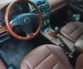 Черный Мазда 6, объемом двигателя 2 л и пробегом 245 тыс. км за 4999 $, фото 4 на Automoto.ua