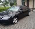 Черный Мазда 6, объемом двигателя 2 л и пробегом 415 тыс. км за 4500 $, фото 1 на Automoto.ua