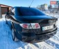 Черный Мазда 6, объемом двигателя 2 л и пробегом 330 тыс. км за 3300 $, фото 4 на Automoto.ua