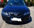 Черный Мазда 6, объемом двигателя 2 л и пробегом 303 тыс. км за 4200 $, фото 1 на Automoto.ua
