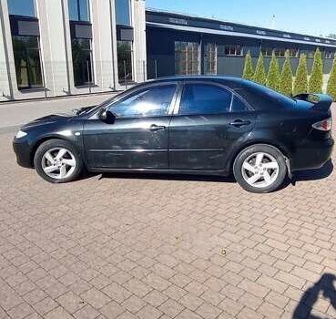 Черный Мазда 6, объемом двигателя 2 л и пробегом 374 тыс. км за 4199 $, фото 4 на Automoto.ua