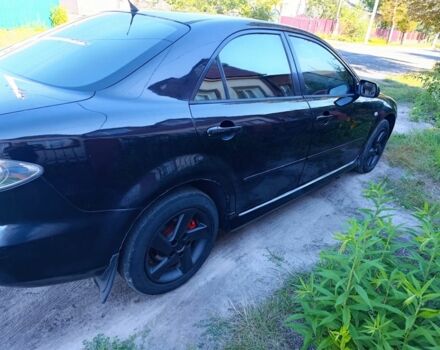 Черный Мазда 6, объемом двигателя 2 л и пробегом 350 тыс. км за 2999 $, фото 1 на Automoto.ua