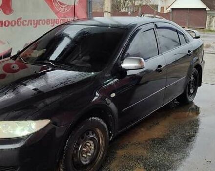 Черный Мазда 6, объемом двигателя 2 л и пробегом 317 тыс. км за 3000 $, фото 3 на Automoto.ua