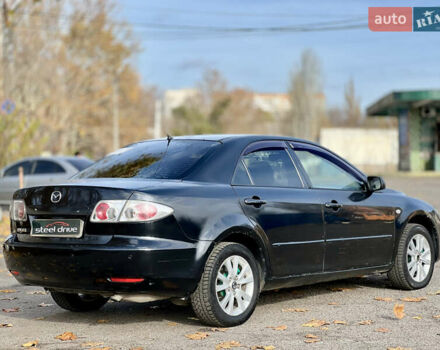 Чорний Мазда 6, об'ємом двигуна 2 л та пробігом 242 тис. км за 3499 $, фото 3 на Automoto.ua