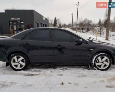 Черный Мазда 6, объемом двигателя 2 л и пробегом 350 тыс. км за 2400 $, фото 4 на Automoto.ua