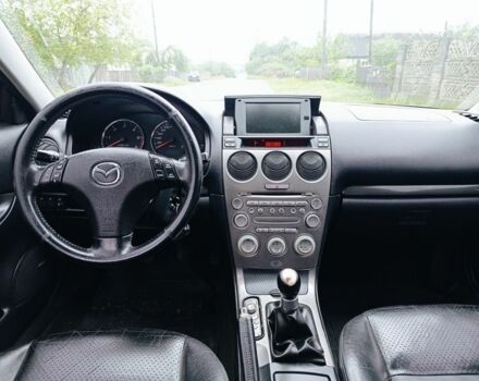 Черный Мазда 6, объемом двигателя 2 л и пробегом 350 тыс. км за 2999 $, фото 5 на Automoto.ua