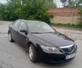Чорний Мазда 6, об'ємом двигуна 1.8 л та пробігом 295 тис. км за 3709 $, фото 2 на Automoto.ua