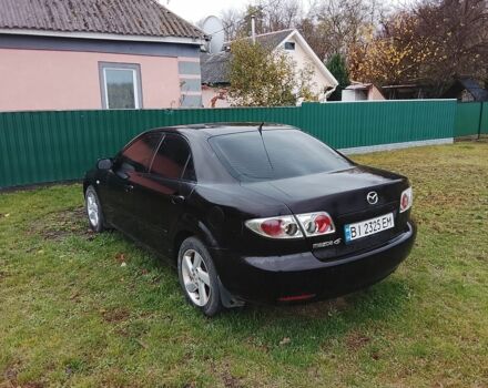 Черный Мазда 6, объемом двигателя 2 л и пробегом 99 тыс. км за 2500 $, фото 2 на Automoto.ua