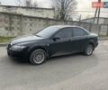 Чорний Мазда 6, об'ємом двигуна 1.8 л та пробігом 200 тис. км за 2000 $, фото 2 на Automoto.ua