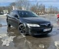Черный Мазда 6, объемом двигателя 2 л и пробегом 300 тыс. км за 1900 $, фото 2 на Automoto.ua