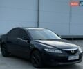 Черный Мазда 6, объемом двигателя 1.8 л и пробегом 390 тыс. км за 3500 $, фото 1 на Automoto.ua
