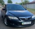 Черный Мазда 6, объемом двигателя 2 л и пробегом 375 тыс. км за 3900 $, фото 1 на Automoto.ua