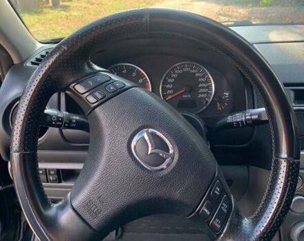 Черный Мазда 6, объемом двигателя 2 л и пробегом 375 тыс. км за 3900 $, фото 4 на Automoto.ua