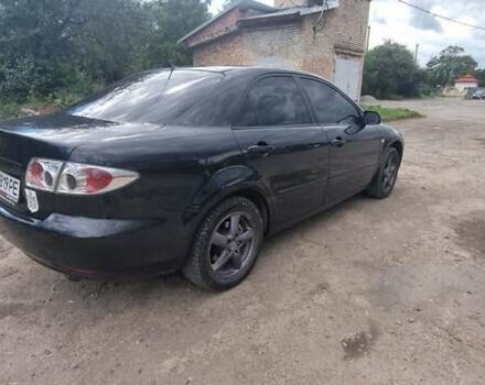 Черный Мазда 6, объемом двигателя 2 л и пробегом 314 тыс. км за 4350 $, фото 8 на Automoto.ua