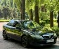 Черный Мазда 6, объемом двигателя 1.8 л и пробегом 395 тыс. км за 3200 $, фото 1 на Automoto.ua