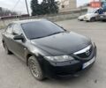 Чорний Мазда 6, об'ємом двигуна 1.8 л та пробігом 200 тис. км за 2000 $, фото 9 на Automoto.ua