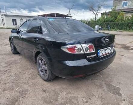 Черный Мазда 6, объемом двигателя 2 л и пробегом 314 тыс. км за 4350 $, фото 9 на Automoto.ua