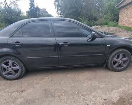 Черный Мазда 6, объемом двигателя 2 л и пробегом 314 тыс. км за 4350 $, фото 5 на Automoto.ua