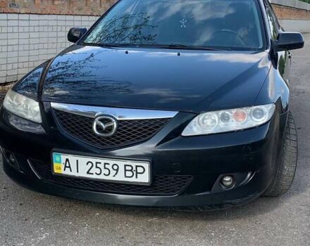 Черный Мазда 6, объемом двигателя 2 л и пробегом 375 тыс. км за 3900 $, фото 2 на Automoto.ua
