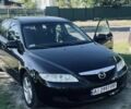 Черный Мазда 6, объемом двигателя 2 л и пробегом 300 тыс. км за 3900 $, фото 1 на Automoto.ua