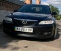 Черный Мазда 6, объемом двигателя 2 л и пробегом 375 тыс. км за 3900 $, фото 1 на Automoto.ua