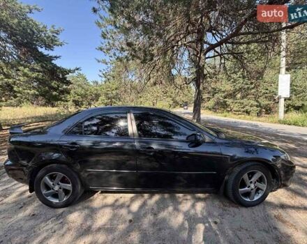 Черный Мазда 6, объемом двигателя 2 л и пробегом 250 тыс. км за 6000 $, фото 2 на Automoto.ua