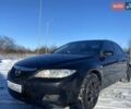 Черный Мазда 6, объемом двигателя 1.8 л и пробегом 260 тыс. км за 3600 $, фото 2 на Automoto.ua