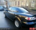 Черный Мазда 6, объемом двигателя 1.8 л и пробегом 300 тыс. км за 2999 $, фото 4 на Automoto.ua