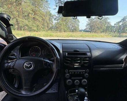 Черный Мазда 6, объемом двигателя 2 л и пробегом 250 тыс. км за 6000 $, фото 1 на Automoto.ua
