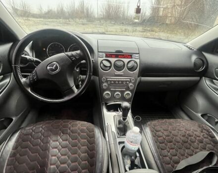 Черный Мазда 6, объемом двигателя 2 л и пробегом 185 тыс. км за 4100 $, фото 5 на Automoto.ua