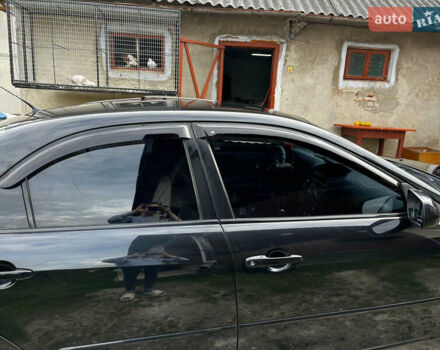 Черный Мазда 6, объемом двигателя 1.8 л и пробегом 210 тыс. км за 4500 $, фото 2 на Automoto.ua