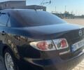 Чорний Мазда 6, об'ємом двигуна 2 л та пробігом 415 тис. км за 4200 $, фото 4 на Automoto.ua