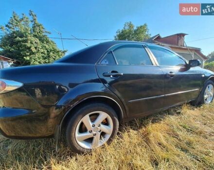 Черный Мазда 6, объемом двигателя 2 л и пробегом 218 тыс. км за 5000 $, фото 9 на Automoto.ua