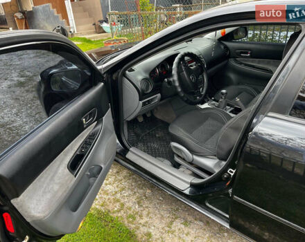 Черный Мазда 6, объемом двигателя 1.8 л и пробегом 210 тыс. км за 4500 $, фото 7 на Automoto.ua