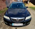 Черный Мазда 6, объемом двигателя 2 л и пробегом 300 тыс. км за 2850 $, фото 1 на Automoto.ua