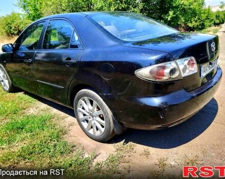 Черный Мазда 6, объемом двигателя 2 л и пробегом 270 тыс. км за 2900 $, фото 1 на Automoto.ua