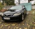 Черный Мазда 6, объемом двигателя 2 л и пробегом 257 тыс. км за 5500 $, фото 1 на Automoto.ua
