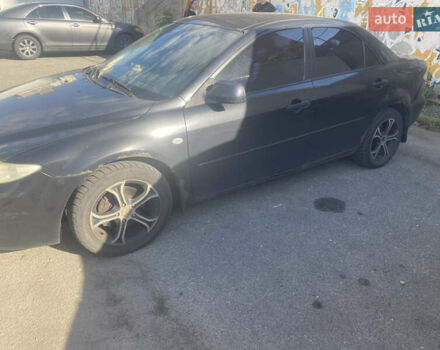 Черный Мазда 6, объемом двигателя 2 л и пробегом 320 тыс. км за 2800 $, фото 1 на Automoto.ua