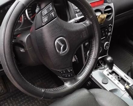 Черный Мазда 6, объемом двигателя 2 л и пробегом 185 тыс. км за 5000 $, фото 12 на Automoto.ua
