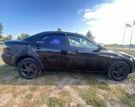 Черный Мазда 6, объемом двигателя 2 л и пробегом 283 тыс. км за 3100 $, фото 2 на Automoto.ua